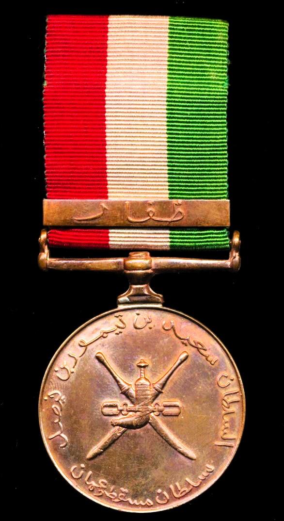 Oman (Sultanate): General Service Medal with clasp 'Dhofar'. 1st type strike with obverse cyphers of 'Sultan Said bin Taimur' (reigned 1932-1970)