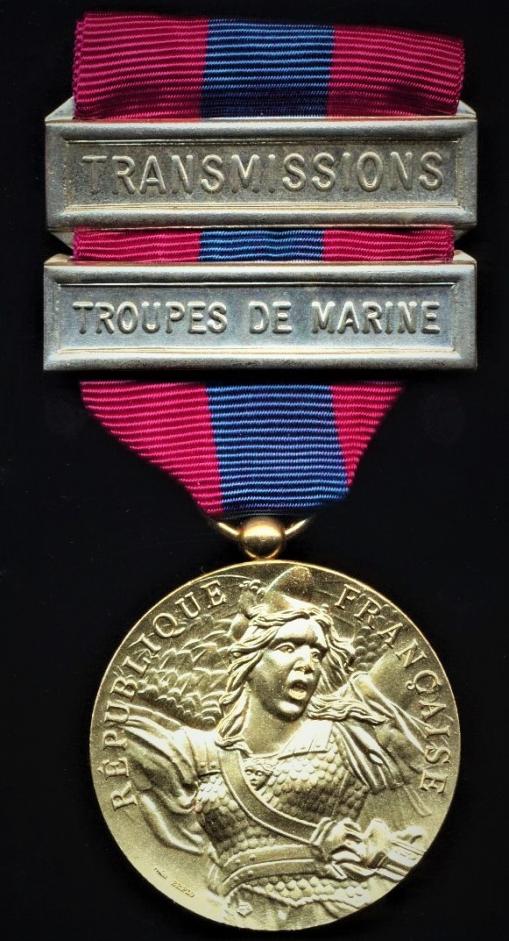 France: National Defence Medal (Medaille de la Defense Nationale). Paris Mint model. 3rd Class, or 'Bronze' grade with 2 x clasps 'Troupes De Marine' 'Transmissions'