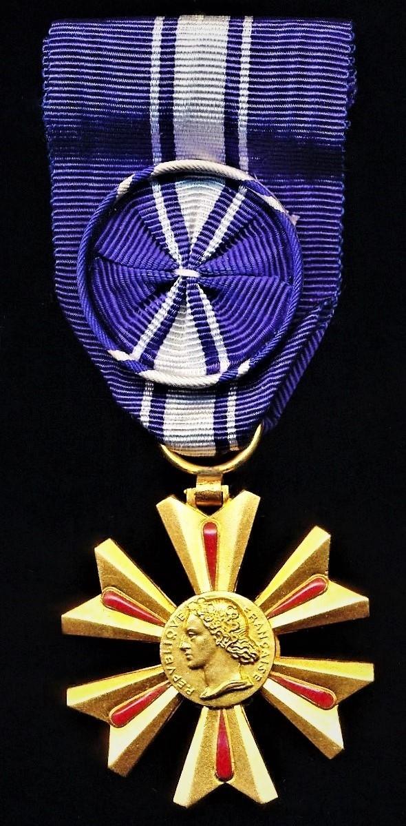 France: Order of Blood Merit 'Officer' class with silk rosette on riband (la Croix de Officier du Merite Sang)