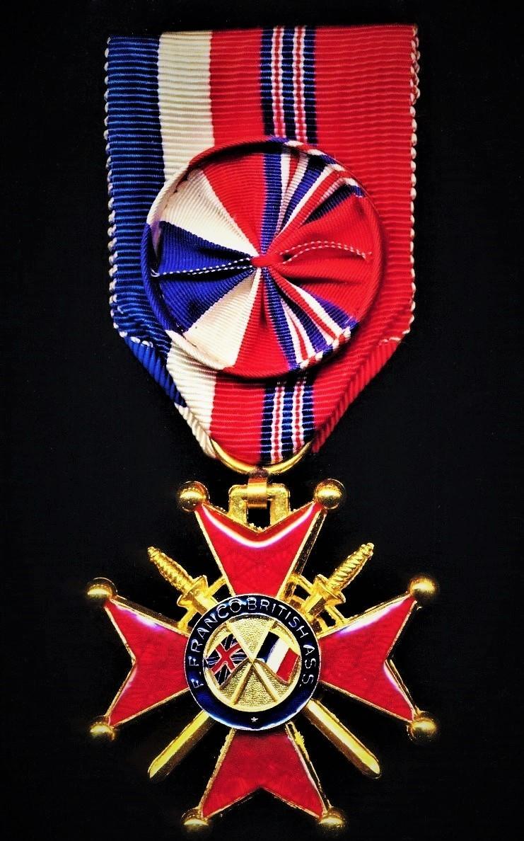 Franco-British Cross of Honour. Officer, breast badge with & rosette on riband (Croix d’Honneur Franco-Britannique, Officier classe)