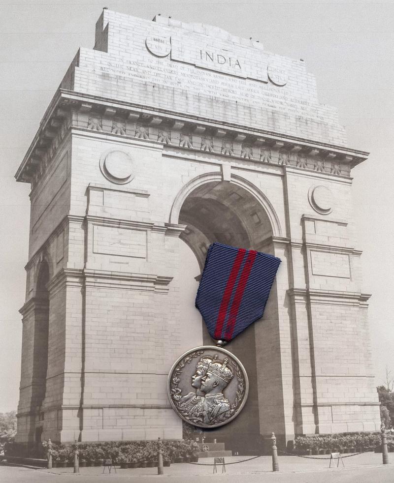 Delhi Durbar Medal 1911. Silver issue. The medal contemporary engraved in Urdu/Persian script (666 Driver Gauhar Ali, 27th Mule Corps)