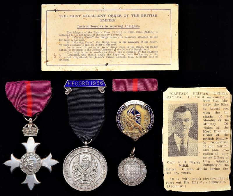 A unique Colonial M.B.E. lot to a former Militia Officer & Pioneer 'Commonwealth Games Medal Winner' from the first ever Commonwealth Games: Captain Bertie Pelham Bayley, M.B.E., British Guiana Militia