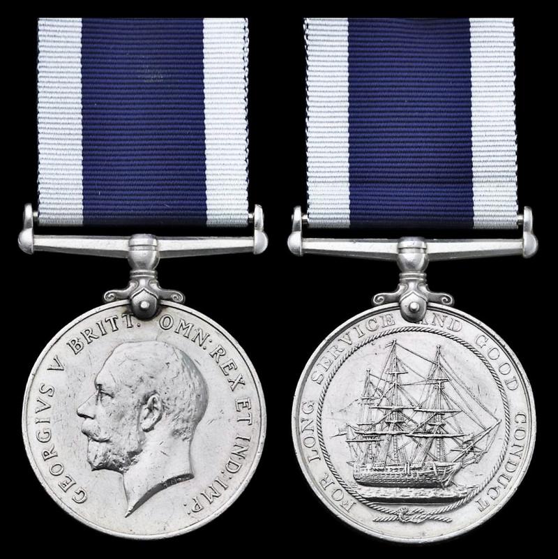 Naval Long Service and Good Conduct Medal. GV coinage head (J.76143 W. McKenzie, A,B. H.M.S. Rodney)