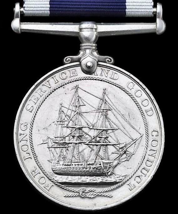 Naval Long Service and Good Conduct Medal. GV coinage head (J.76143 W. McKenzie, A,B. H.M.S. Rodney)