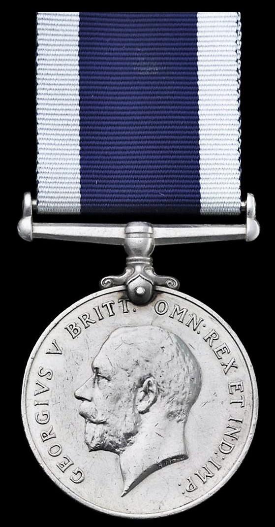 Naval Long Service and Good Conduct Medal. GV coinage head (J.76143 W. McKenzie, A,B. H.M.S. Rodney)