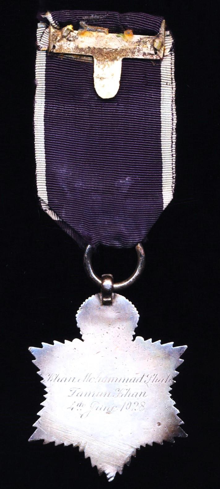 India Title Badge. 3rd Class 'Khan Sahib'. GV issue, 'portrait facing right' in silver and enamel (Khan Mohammad Khan / Zaman Khan / 4th June 1928)