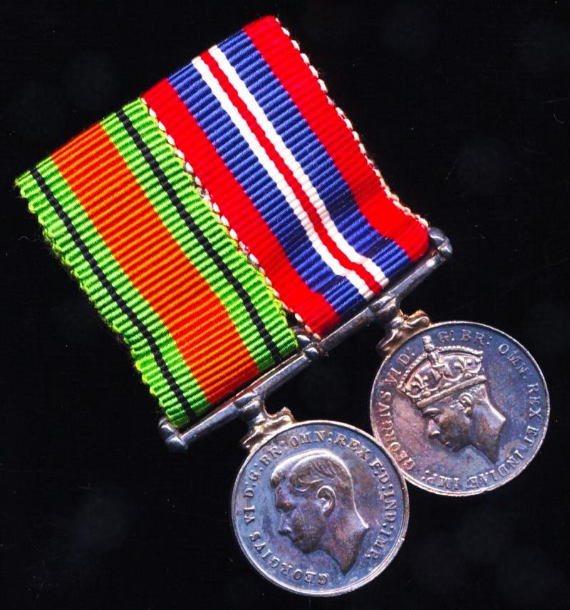 A contemporary mounted pair of silver miniature Second World War campaign medals