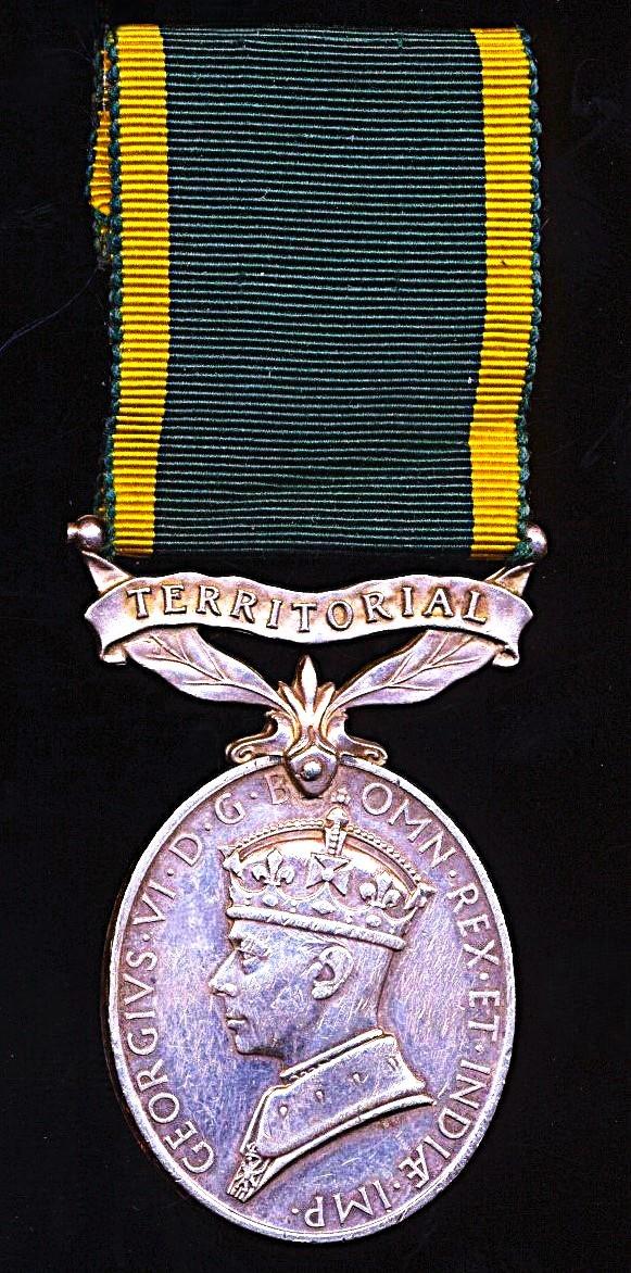 Efficiency Medal. GVI 1st issue with 'Territorial' bar (2066586. Sjt. C. C. Garner R.A.)