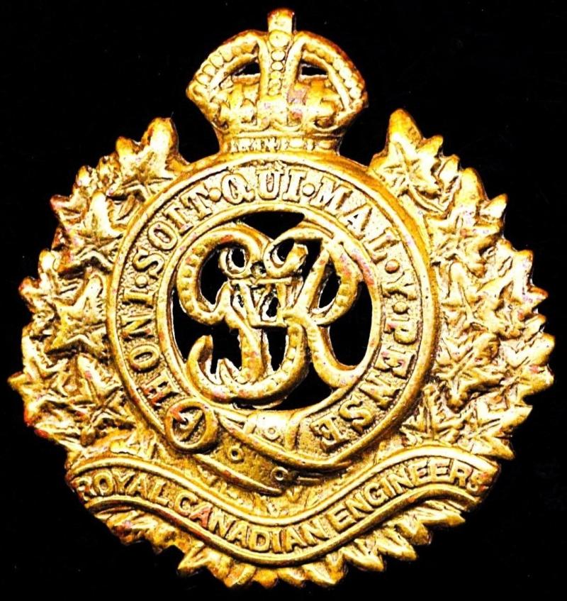 Canada (Dominion): Royal Canadian Engineers. Gilding metal die struck King's Crown cap badge, with GVI cypher