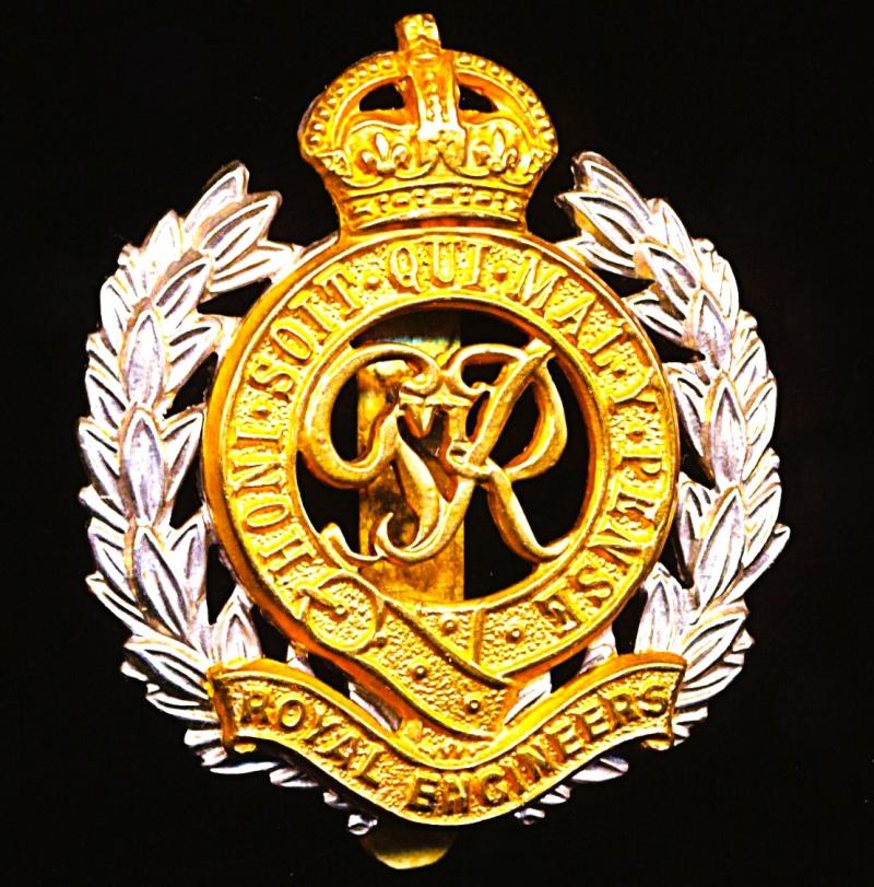 Royal Engineers. GVI King's Crown bi-metal die-struck cap badge with fretted laurels & voided centre. Circa 1947-1952
