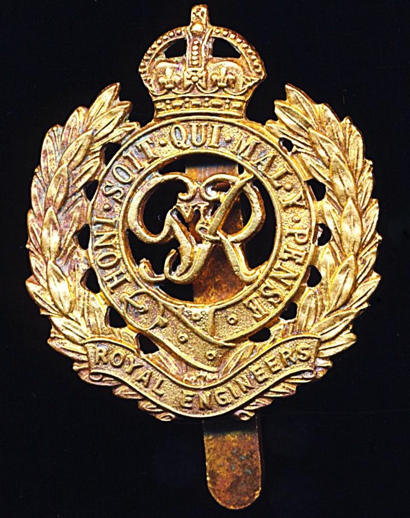 Royal Engineers. GVI King's Crown gilding metal cap badge. Die-cast with fretted laurels & voided centre. Circa 1937-1946