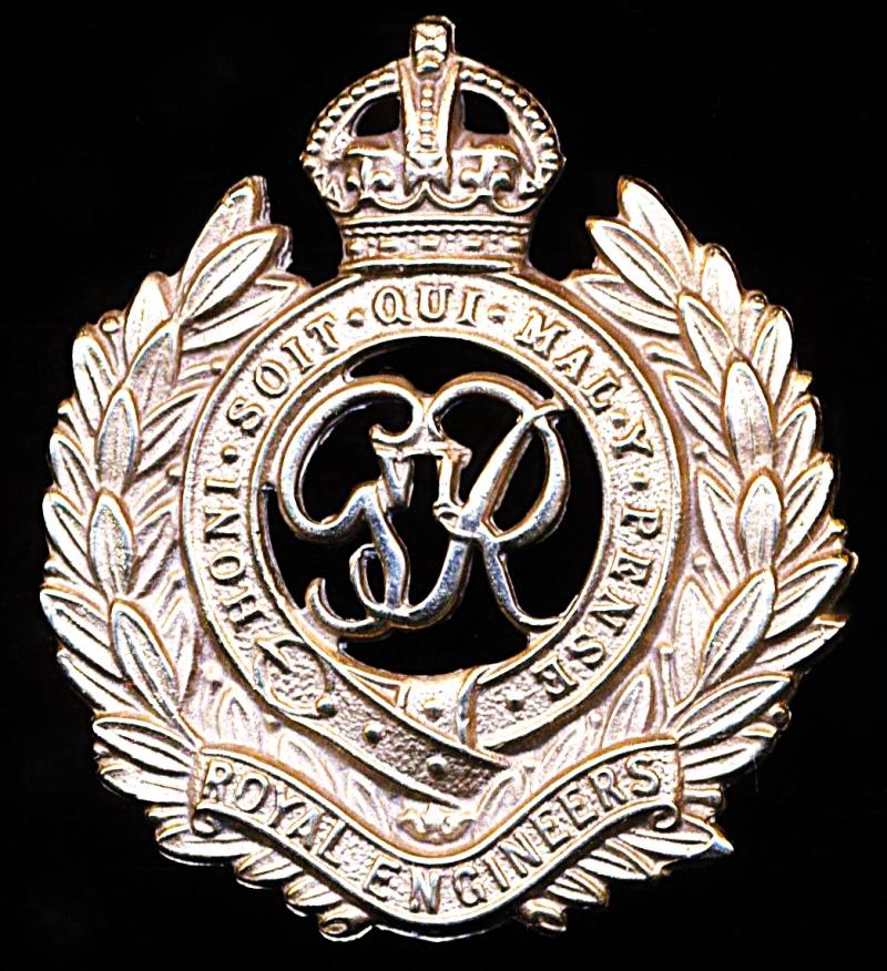 Royal Engineers. GVI King's Crown white metal cap badge. Die-struck with voided centre. Circa 1937-1952