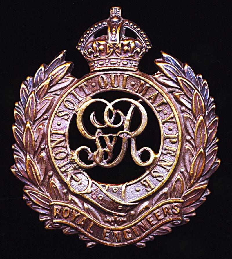 Royal Engineers. GV King's Crown gilding metal cap badge. Die-struck voided centre style. Circa 1911-1914