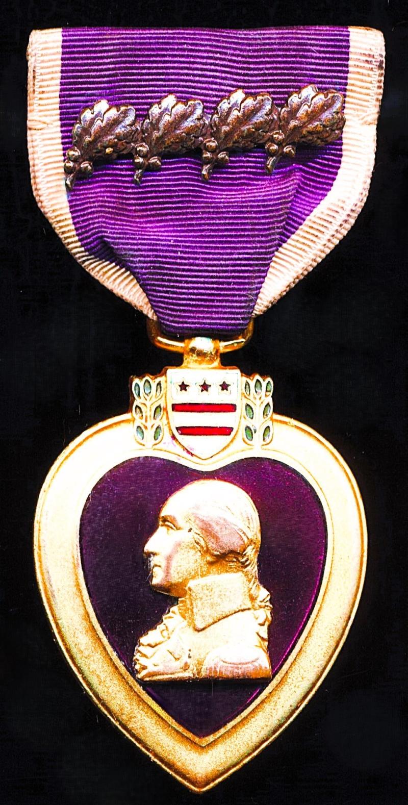 United States: Purple Heart Medal. With 4 x bronze Oakleaf Clusters emblem. Officially numbered on rim (95810)