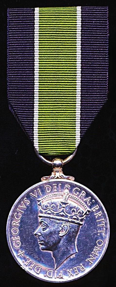 Colonial Police Long Service and Good Conduct Medal. GVI second issue (6394 Const. Awang Bin Hussain, Fed. Malaya Police.)