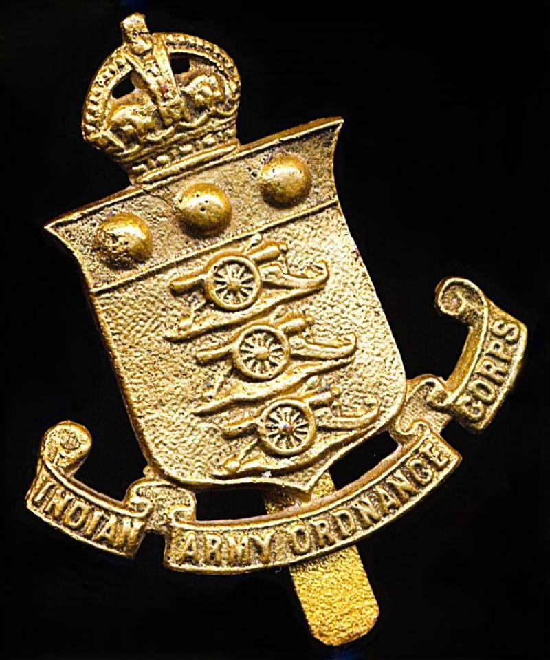 British India: Indian Army Ordnance Corps. King's crown gilding metal cap badge (as worn 1922-47)