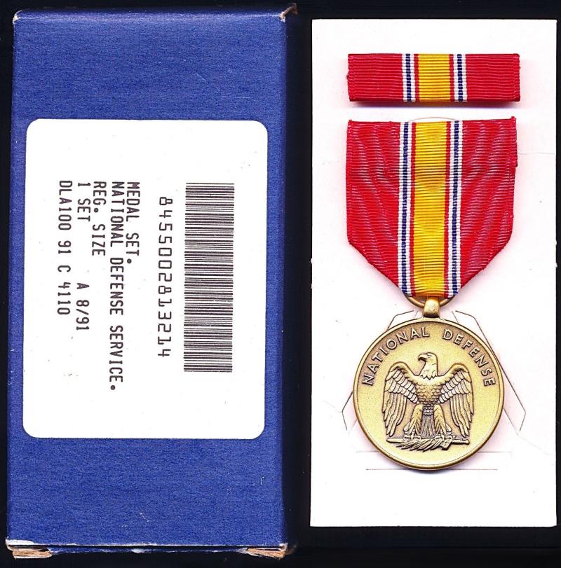 United States: National Defense Service Medal. A boxed set with companion loose single space riband bar