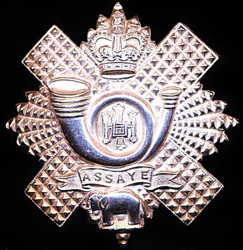 Highland Light Infantry. Cap Badge. Queen's Crown white-metal as worn by Other-Ranks. Circa 1952-1959