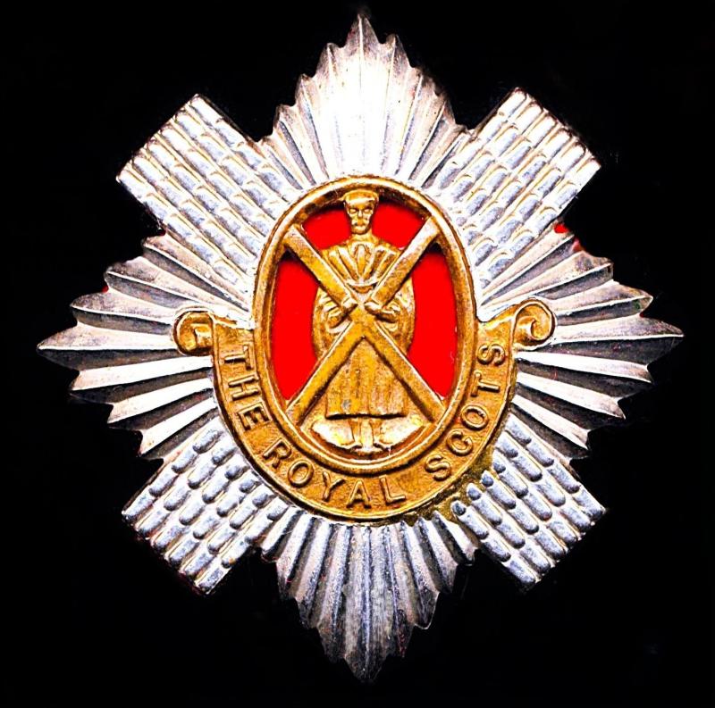 Royal Scots: Cap Badge. 1st Battalion (and Territorial Force / Territorial Army Battalions). Bi-metal with red cloth insert, as worn circa 1899-1952