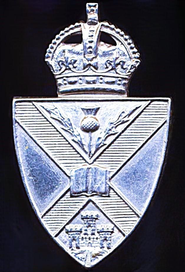 Edinburgh University Officers Training Corps (O.T.C.). Kings Crown white metal collar badge