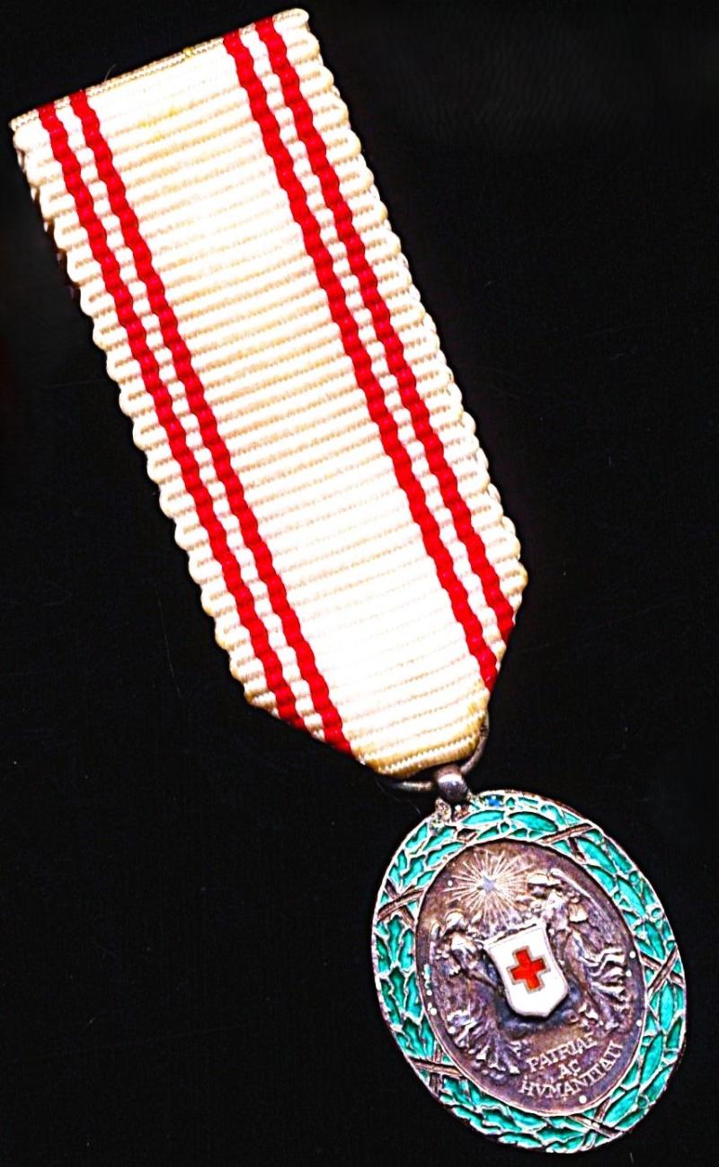 Austria (Imperial): The Medal for Services to the Red Cross. Silver grade with 'War Decoration' 1914-18. Miniature medal