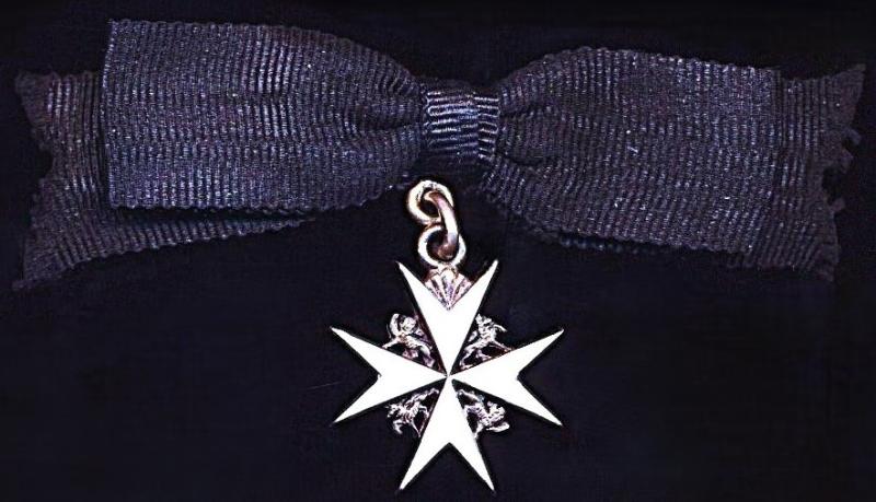 United Kingdom: Miniature The Order of St. John of Jerusalem: Officer (Sister) silver & enamel lady’s shoulder badge