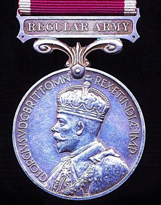 Military Long Service & Good Conduct Medal. GV with 'Regular Army' bar (1042100 Cpl. J. Flynn. R.E.)