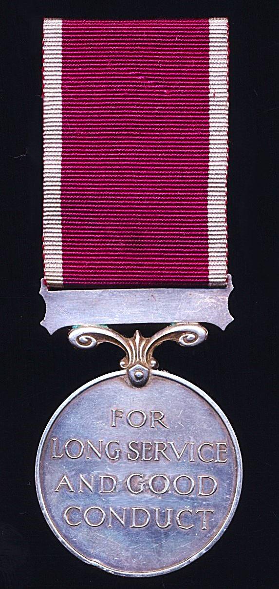 Military Long Service & Good Conduct Medal. GV with 'Regular Army' bar (1042100 Cpl. J. Flynn. R.E.)