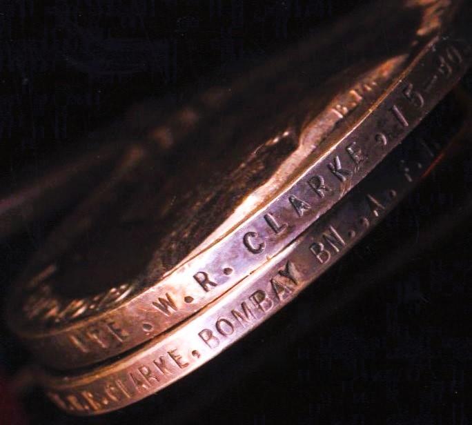 A Volunteer's 'East Africa' casualty medal group of 7: Assistant Controller of Customs, William Robert Clarke, M.B.E., H.M. Indian Customs Service late No. 1 Gun, Bombay Section Volunteer Maxim Gun Company & Bombay Volunteer Rifles